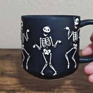 Dancing Skeletons Black Earthenware 13 oz 3D Embossed Black Mug.